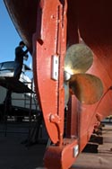 Wooden boat in boatyard